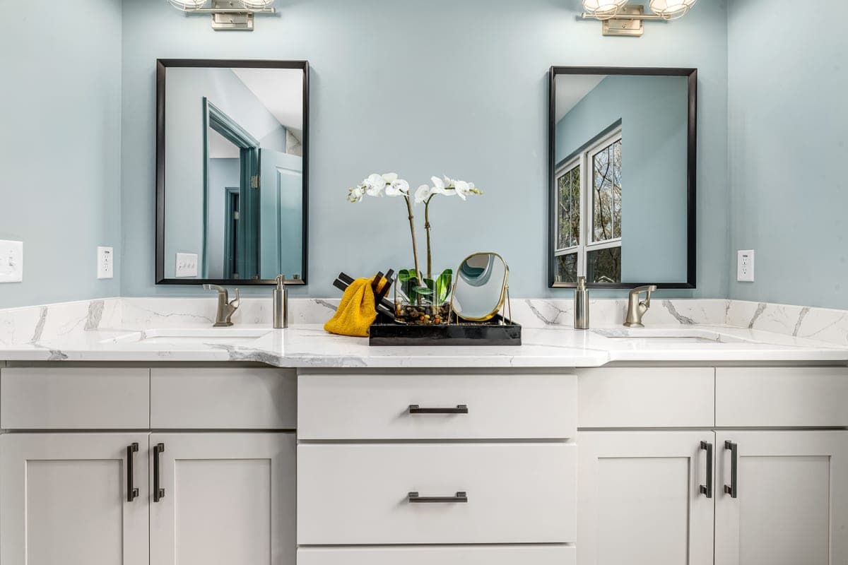 A bathroom vanity with the cabinet space beneath the sink